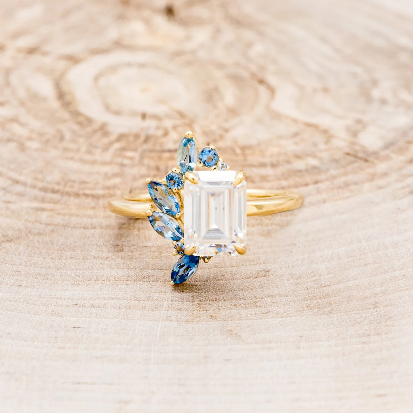 "ISABELLA" - EMERALD CUT MOISSANITE ENGAGEMENT RING WITH AQUAMARINE ACCENTS - Image 4